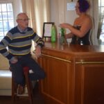 Barmaid Sara Serves George