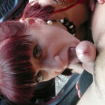 Mature slut sucking two guys from a car