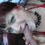 Mature slut sucking two guys from a car