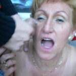 Horny mature slut sucking two guys in the woods