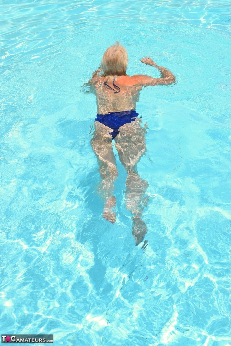 Topless In The Swimming Pool